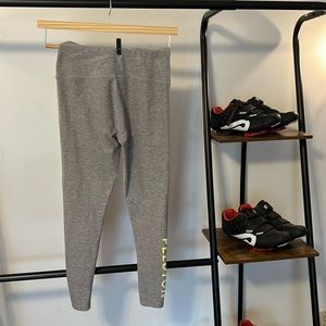 Peloton + Beyond Yoga grey & yellow leggings